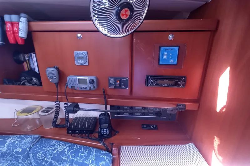 We Reach Yacht Photos Pics Interior of 2011 Dufour 425 Grand Large yacht with navigation equipment and controls.