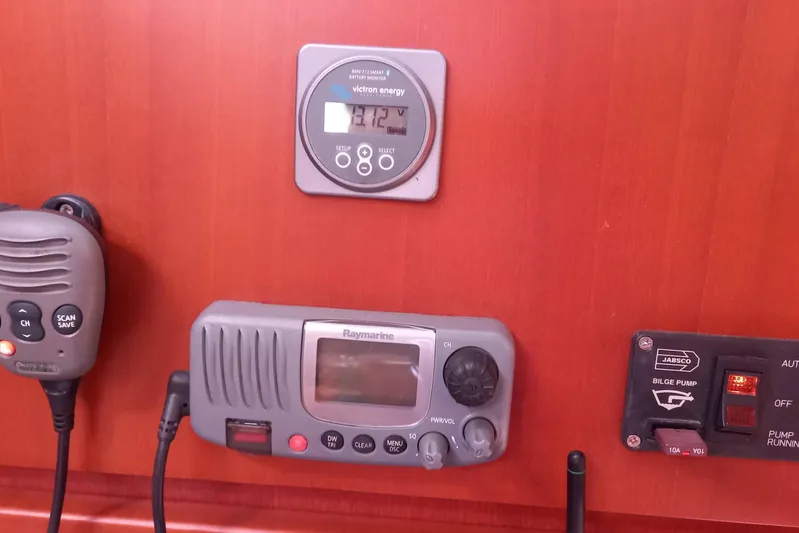 We Reach Yacht Photos Pics Control panel of a 2011 Dufour 425 Grand Large yacht with radio and bilge pump.