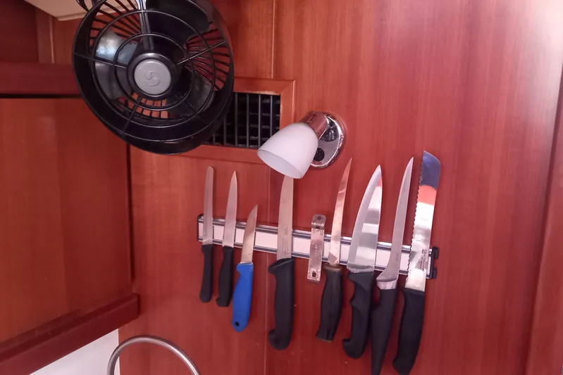 We Reach Yacht Photos Pics Magnetic knife rack and fan in 2011 Dufour 425 Grand Large yacht kitchen.
