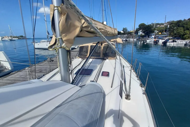We Reach Yacht Photos Pics Sailboat Dufour 425 Grand Large 2011 docked in a serene marina setting.
