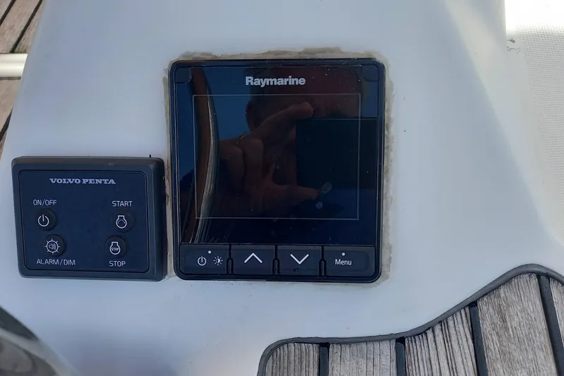 We Reach Yacht Photos Pics Control panel on 2011 Dufour 425 Grand Large yacht, featuring Raymarine and Volvo Penta systems.