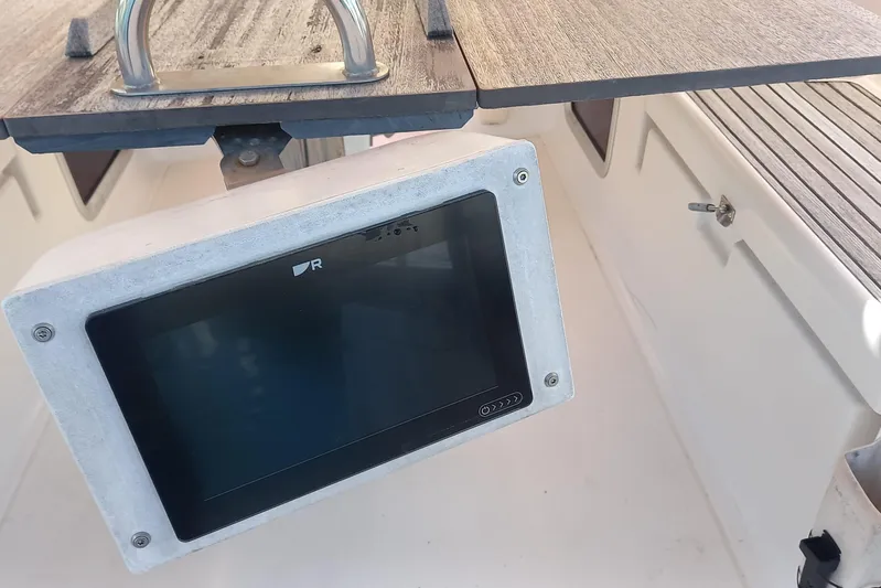 We Reach Yacht Photos Pics Control panel on a 2011 Dufour 425 Grand Large sailboat cockpit.