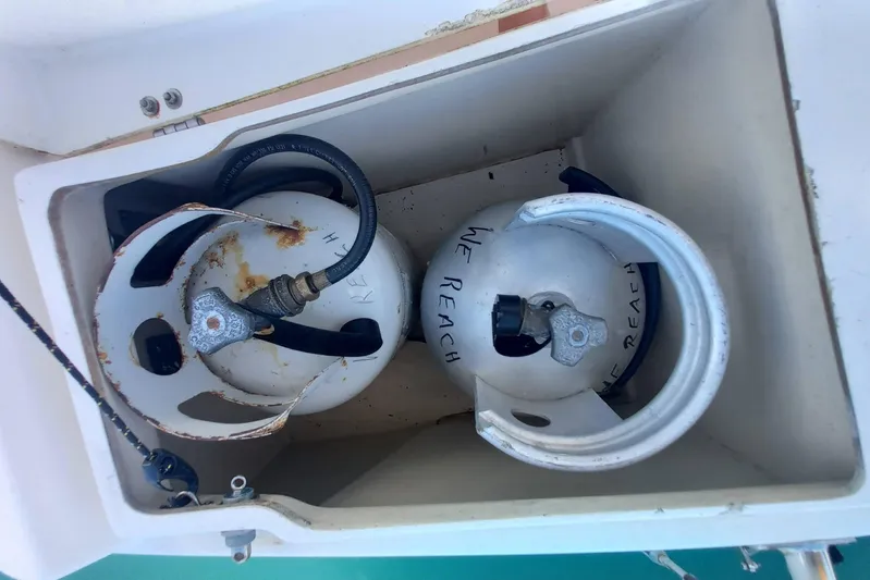 We Reach Yacht Photos Pics Propane tanks in storage compartment of 2011 Dufour 425 Grand Large sailboat.
