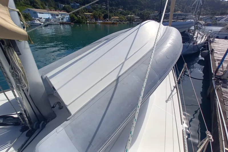 We Reach Yacht Photos Pics Dufour 425 Grand Large 2011 sailboat docked with inflatable dinghy on deck.