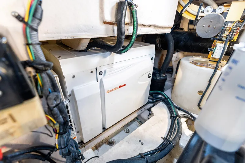 Guilty Pleasure Yacht Photos Pics Engine room of 2014 Sea Ray 510 Fly with Cummins Onan generator.