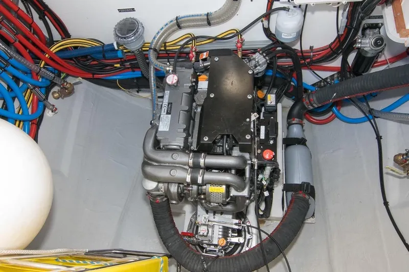 Oui Cherie Yacht Photos Pics Engine room of 2017 Lagoon 52 F yacht with visible wiring and components.