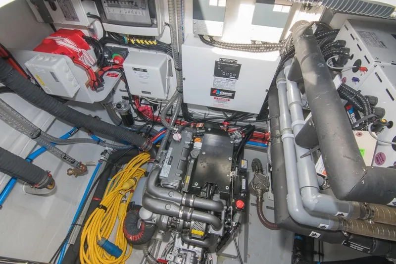 Oui Cherie Yacht Photos Pics Engine room of 2017 Lagoon 52 F yacht with visible machinery and wiring.