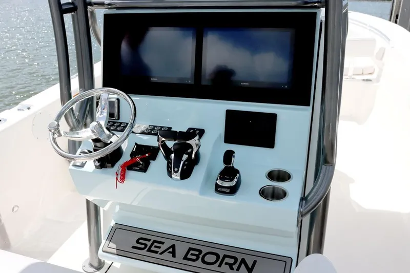  Yacht Photos Pics Manufacturer Provided Image: 2025 Sea Born LX26 Center Console boat dashboard with dual screens and steering wheel.