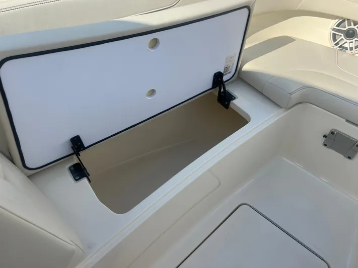  Yacht Photos Pics Open storage compartment on 2025 Scout 277 Dorado boat interior.