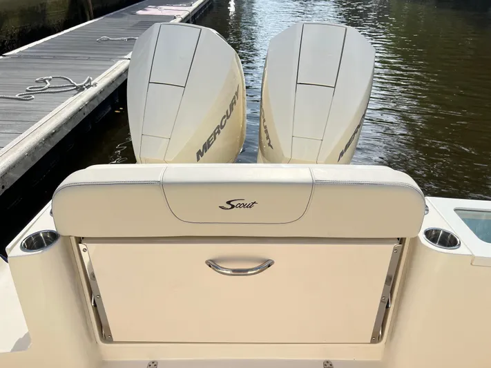  Yacht Photos Pics 2025 Scout 277 Dorado boat with dual Mercury engines at dock.