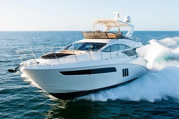 Kings' Ransom Yacht Photos Pics Manufacturer Provided Image: 2017 Sea Ray L590 Fly yacht cruising on open water.
