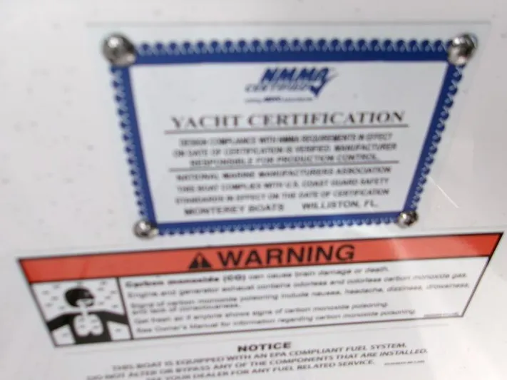  Yacht Photos Pics Yacht certification and warning labels on a 2025 Monterey Elite 27 OB boat.