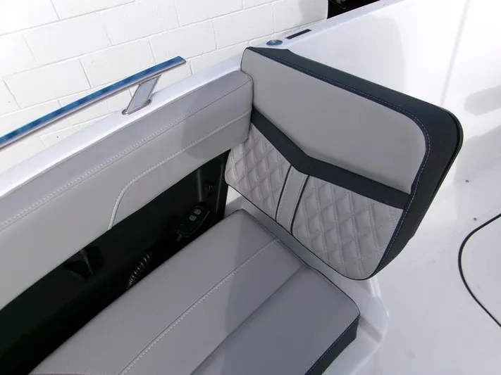  Yacht Photos Pics 2025 Monterey Elite 27 OB boat interior with stylish gray seating and quilted design.