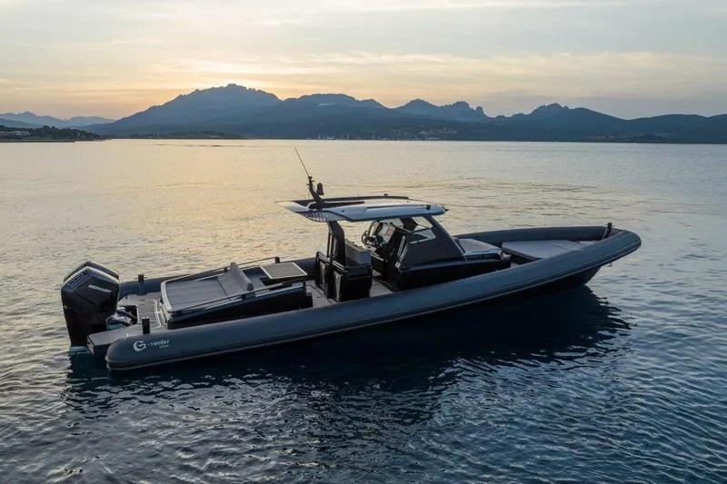  Yacht Photos Pics 2026 G-Tender DIECI4 boat on serene water at sunset, with mountains in the background.