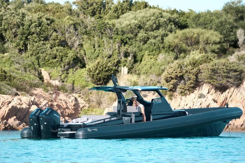  Yacht Photos Pics 2026 G-Tender DIECI4 boat on clear water, lush green background.