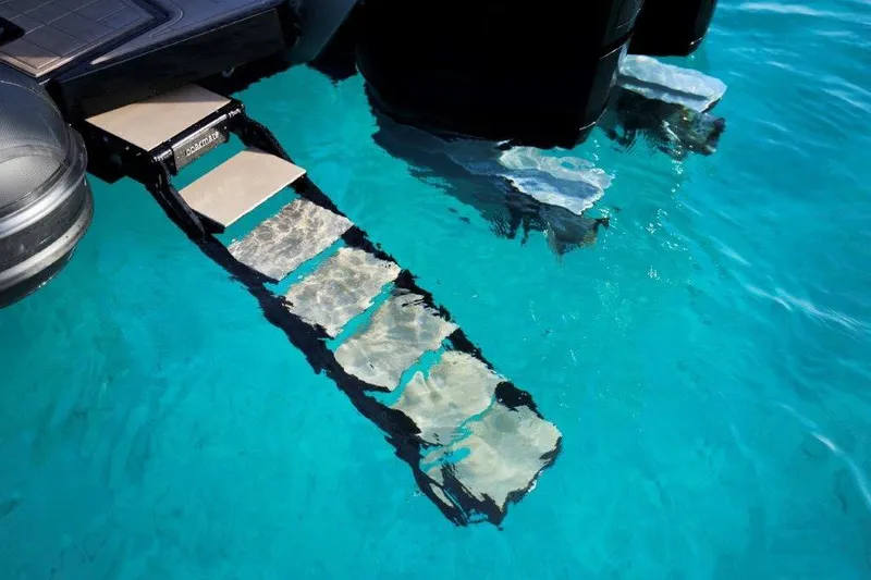  Yacht Photos Pics Boat ladder submerged in clear blue water, G-Tender DIECI4, 2026 model.