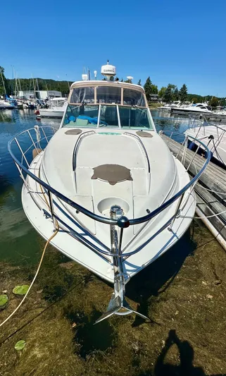  Yacht Photos Pics 2005 Doral Boca Grande boat docked at marina under clear blue sky.