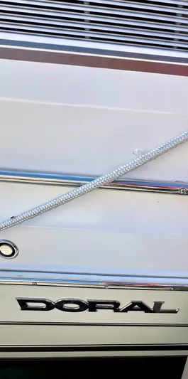  Yacht Photos Pics 2005 Doral Boca Grande boat with chrome details and rope.