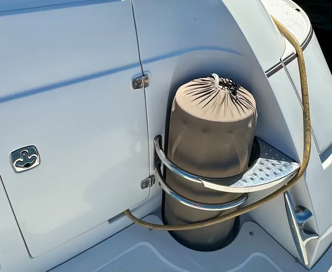  Yacht Photos Pics 2005 Doral Boca Grande boat detail with storage compartment and protective cover.