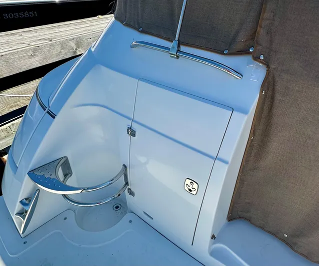  Yacht Photos Pics 2005 Doral Boca Grande boat stern with stainless steel railing and step.