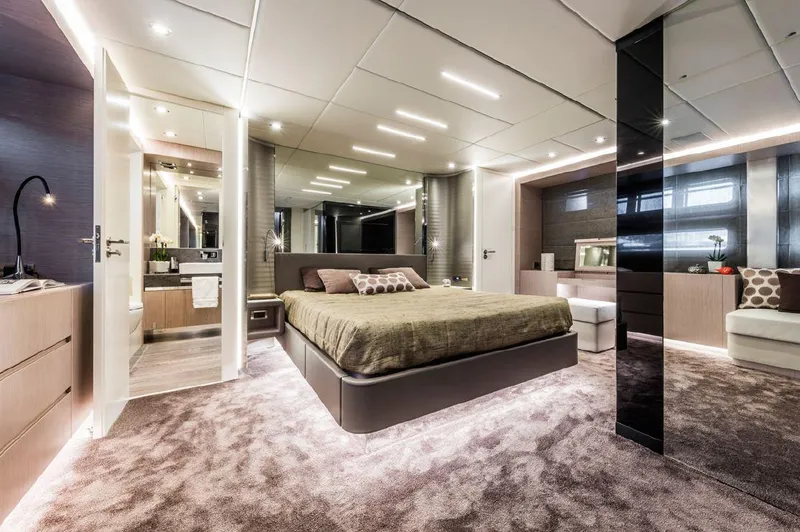 Bull Yacht Photos Pics Luxurious bedroom interior on 2016 Canados 76 GT yacht, featuring modern design and elegant furnishings.