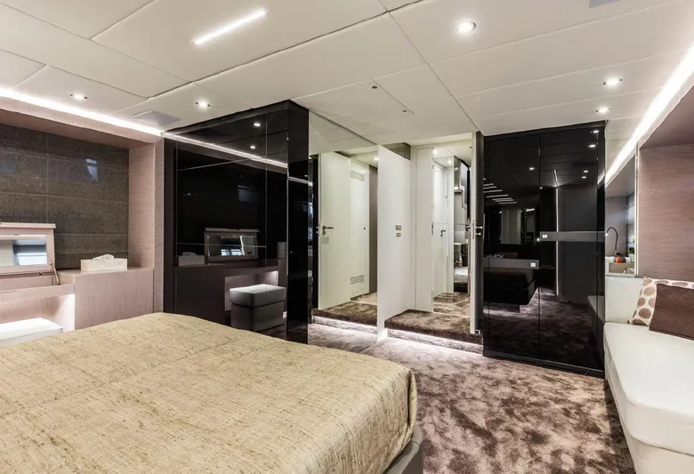 Bull Yacht Photos Pics Luxurious bedroom interior on 2016 Canados 76 GT yacht, featuring modern design and elegant furnishings.