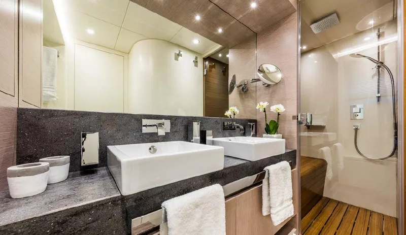 Bull Yacht Photos Pics Luxurious bathroom in 2016 Canados 76 GT yacht with modern fixtures and elegant design.