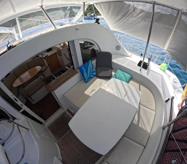 Kelapa Yacht Photos Pics Lagoon 380 S2 2016 yacht interior with seating and table, overlooking the ocean.
