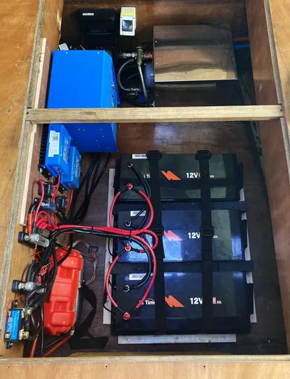 Kelapa Yacht Photos Pics Electrical system setup in a 2016 Lagoon 380 S2, featuring batteries and wiring.