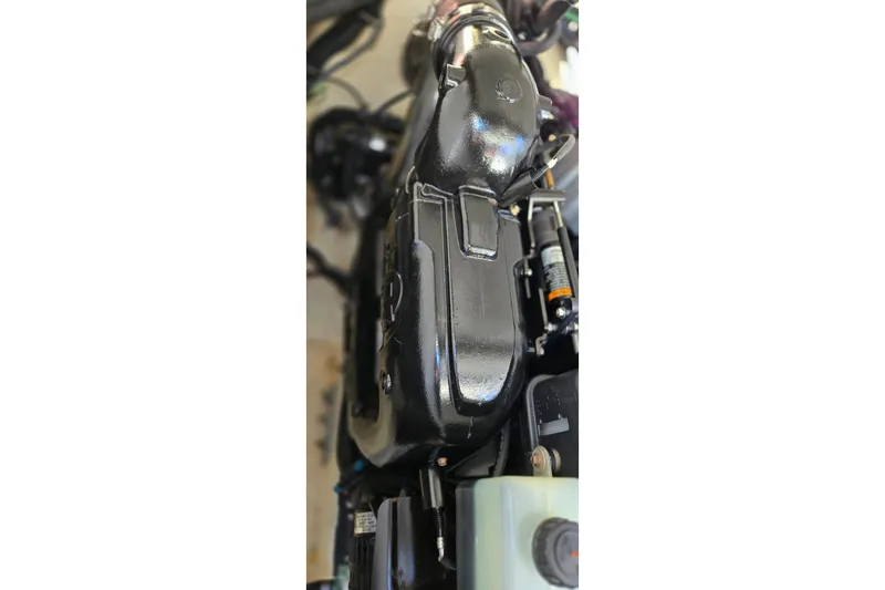 Famous Sport Boat Vibe Yacht Photos Pics Engine component of 2016 Formula 330 Crossover Bowrider, close-up view.