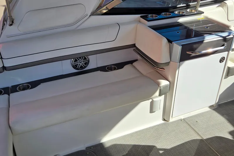 Famous Sport Boat Vibe Yacht Photos Pics 2016 Formula 330 Crossover Bowrider interior with seating and cup holders.