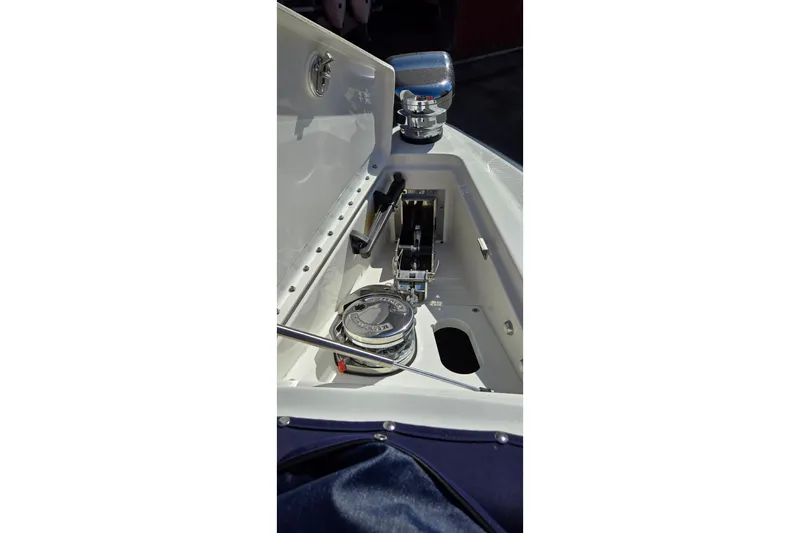 Famous Sport Boat Vibe Yacht Photos Pics 2016 Formula 330 Crossover Bowrider anchor compartment with winch and storage.