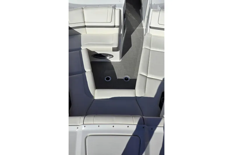 Famous Sport Boat Vibe Yacht Photos Pics 2016 Formula 330 Crossover Bowrider interior with white seating and gray flooring.