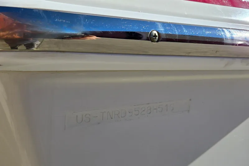 Famous Sport Boat Vibe Yacht Photos Pics 2016 Formula 330 Crossover Bowrider hull identification number close-up.