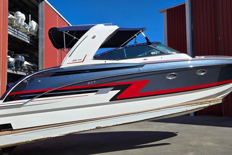 Famous Sport Boat Vibe Yacht Photos Pics 2016 Formula 330 Crossover Bowrider boat with sleek design and vibrant graphics.