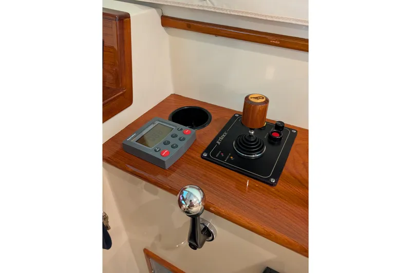 Lady K Yacht Photos Pics Control panel of 2005 Hinckley Picnic Boat 36 Classic EP with joystick and display.