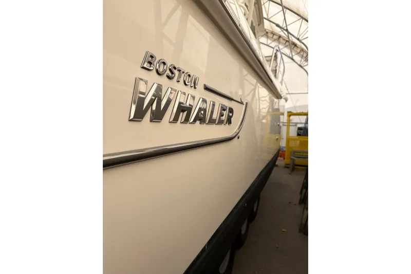 Amy Yacht Photos Pics 2018 Boston Whaler 345 Conquest boat side view in storage facility.