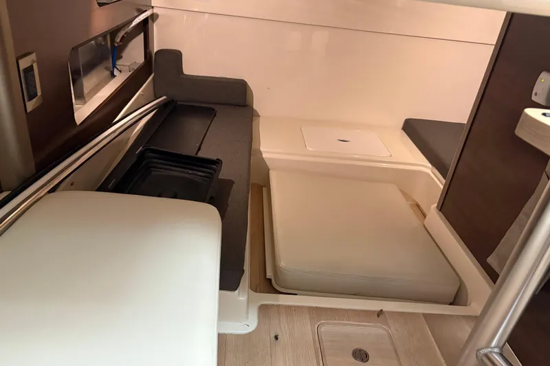Amy Yacht Photos Pics 2018 Boston Whaler 345 Conquest cabin interior with seating and storage.