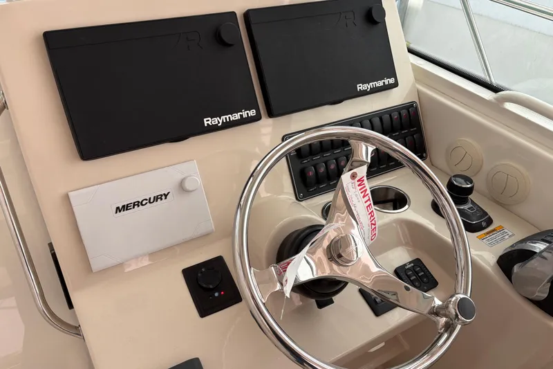 Amy Yacht Photos Pics Control panel of a 2018 Boston Whaler 345 Conquest boat with Raymarine electronics.