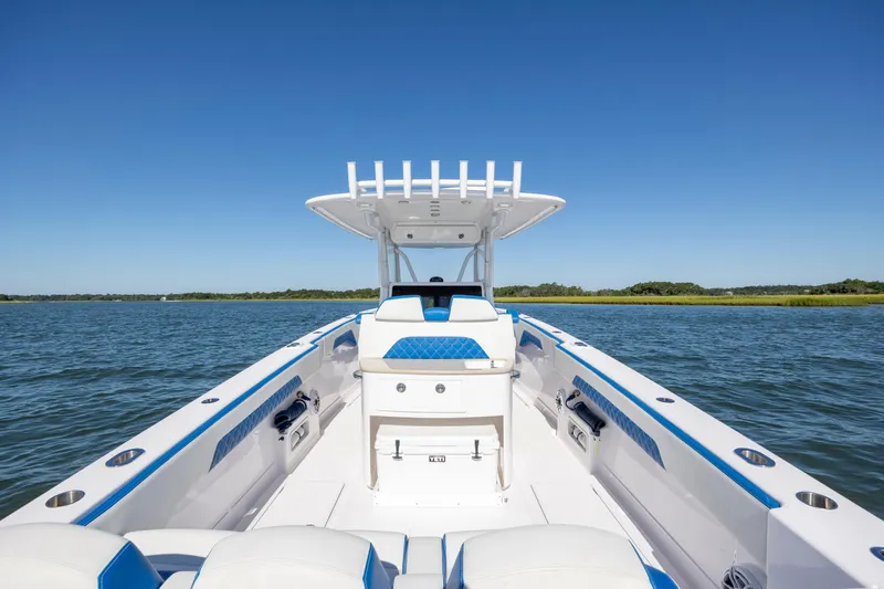  Yacht Photos Pics 2022 Blackwater 36 Sport boat on calm water under clear blue sky.