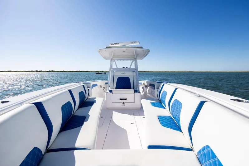  Yacht Photos Pics 2022 Blackwater 36 Sport boat with blue and white seating on open water.