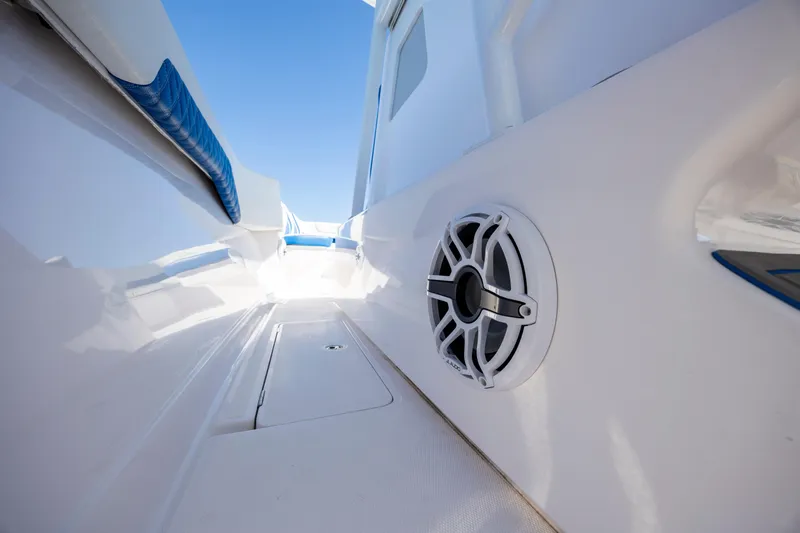  Yacht Photos Pics 2022 Blackwater 36 Sport boat interior with speaker and blue accents.