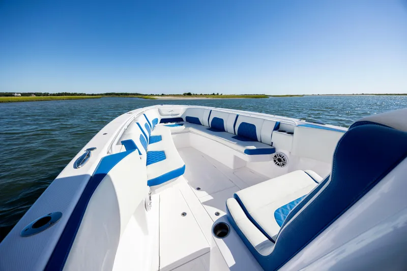  Yacht Photos Pics 2022 Blackwater 36 Sport boat with luxurious seating on a sunny day at sea.