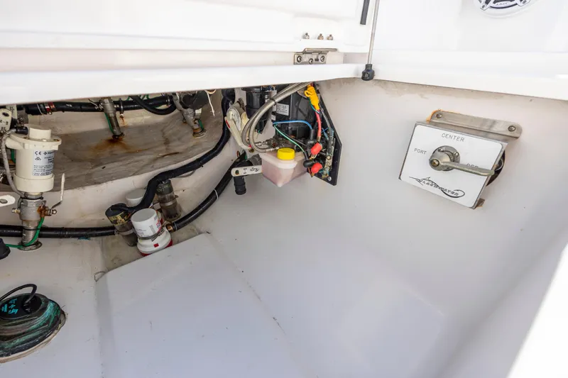  Yacht Photos Pics 2022 Blackwater 36 Sport boat engine compartment with wiring and control panel.