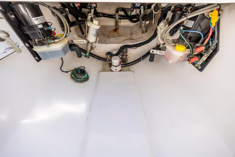  Yacht Photos Pics Engine compartment of 2022 Blackwater 36 Sport boat, showcasing wiring and components.