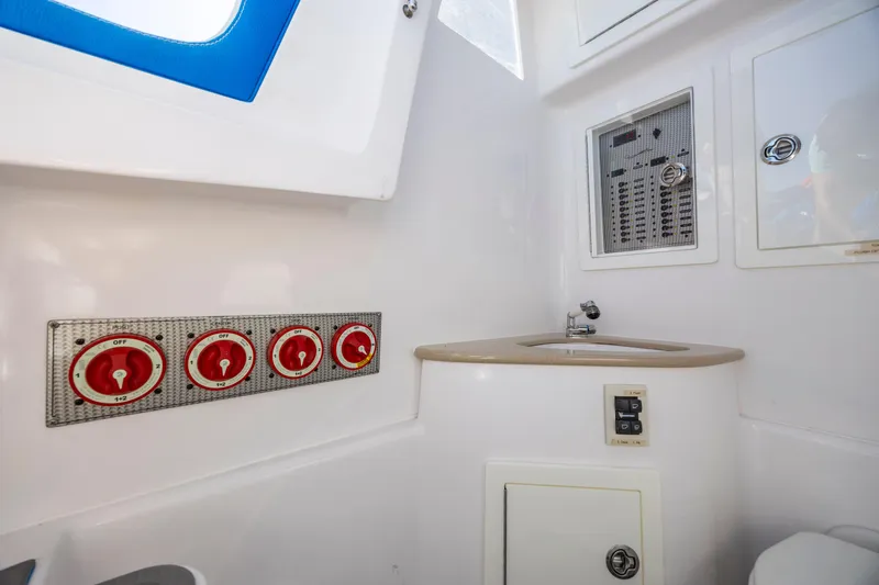  Yacht Photos Pics Interior of 2022 Blackwater 36 Sport boat, featuring control panel and sink area.
