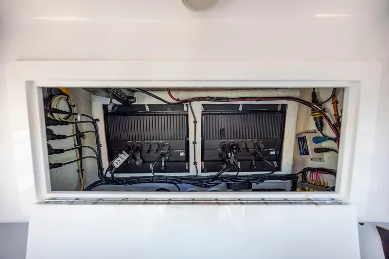  Yacht Photos Pics Electrical panel inside 2022 Blackwater 36 Sport boat, showcasing wiring and components.
