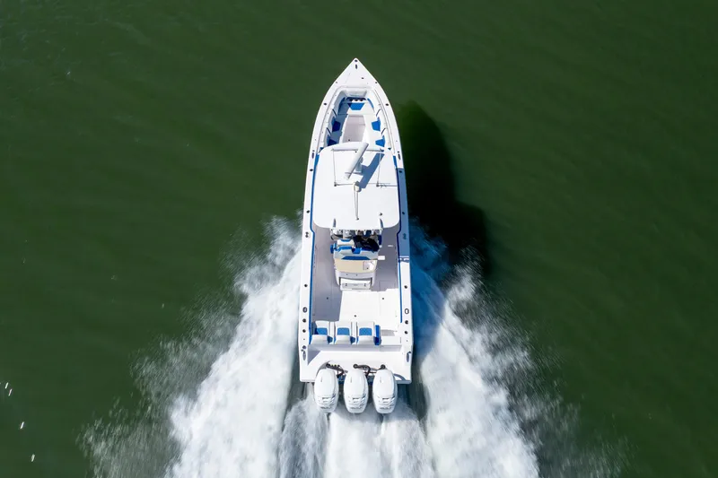  Yacht Photos Pics Aerial view of 2022 Blackwater 36 Sport boat cruising on water.