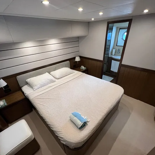  Yacht Photos Pics Luxurious bedroom interior of 2007 Apreamare 65 yacht with ensuite bathroom.