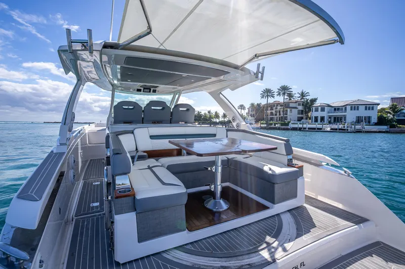  Yacht Photos Pics 2019 Tiara Sport 38 LS luxury yacht with spacious seating and elegant design on the water.